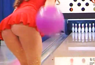 Sexy up skirt video of a tv girl bowling in mini dress