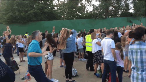 12 - Dad shows off some awesome moves at a concert.