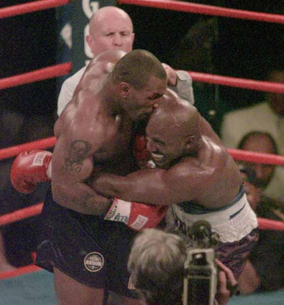 Image result for MAKE GIFS MOTION IMAGES MIKE TYSON BITING EVANDER HOLYFIELD