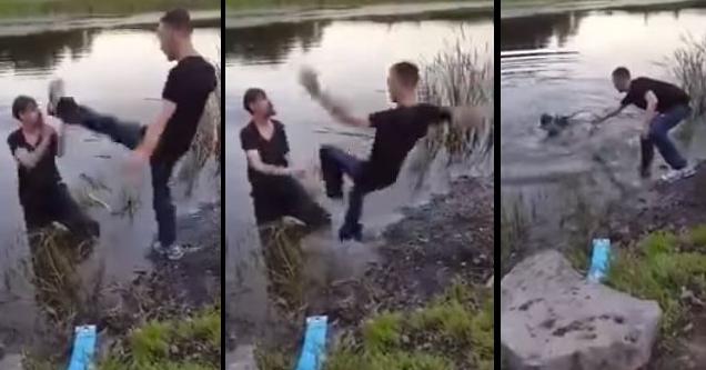 Two Drunk Guys Trying Really Hard To Fight Each Other ByIn A Lake