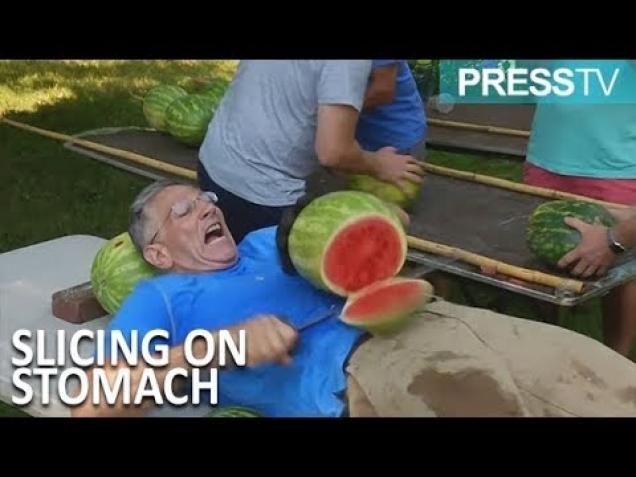 Man With Sword Sets Guinness World Record By Slicing Watermelons On His Chest Video Ebaum