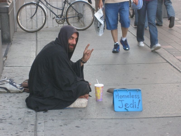 This guy has the best ploy for bumming money on the street.