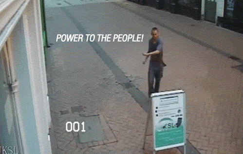 gifs - angry man breaks a sign
