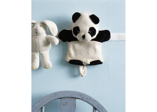 Attach a velcro strip to the wall to store soft toys (also a great way to torture your kids)