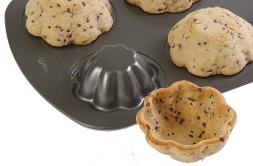 Turn your muffin pan upside down, bake cookie-dough over the top and voila - you have cookie bowls coldstone.