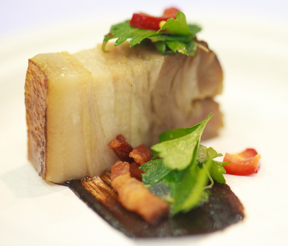 Kimchi Braised Bacon, House Cracker, Black Garlic and Potato Puree, Yuzu and Bacon Vinaigrette