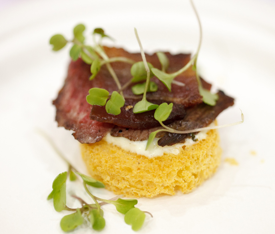 Topless Bacon and Steak Slider on Brioche with Pickled Pepper Horseradish Cream Sauce and Microgreens