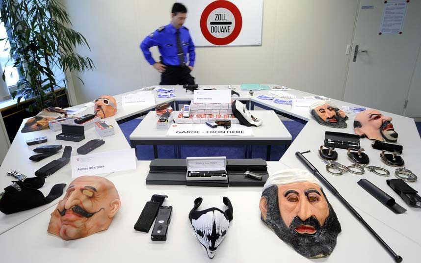 Illegal weapons are often confiscated items at Customs, but not always with such colourful masks. This group was seized at the Swiss border from a group of French citizens.