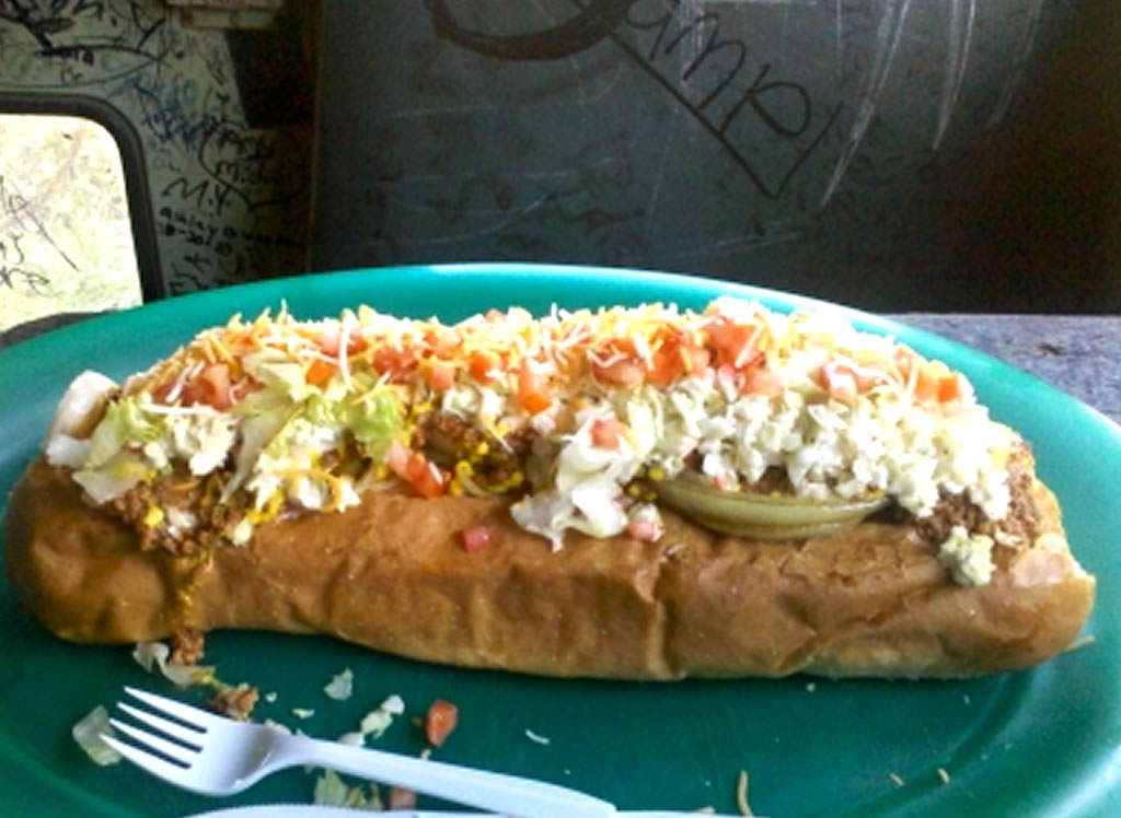 Homewrecker Hot Dog: 15 inch, 1 pound deep fried all-beef hot dog, jalapeÃ±os, habanero sauce, cole slaw, cheese, tomato, lettuce. 