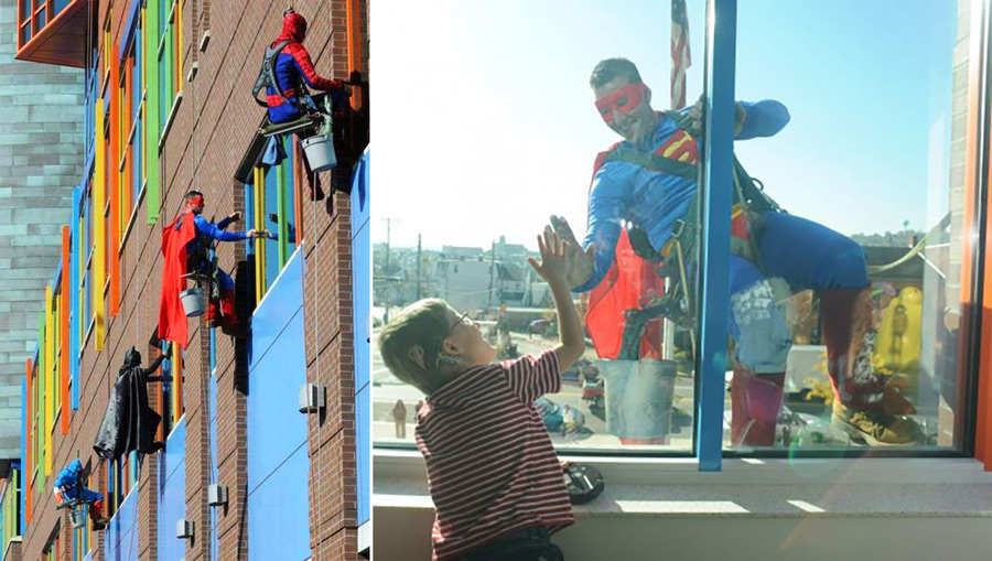 superhero window washers at children's hospital - Ber