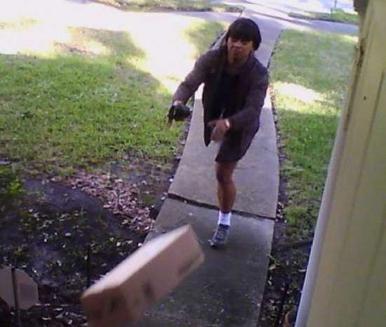 ups driver throwing packages