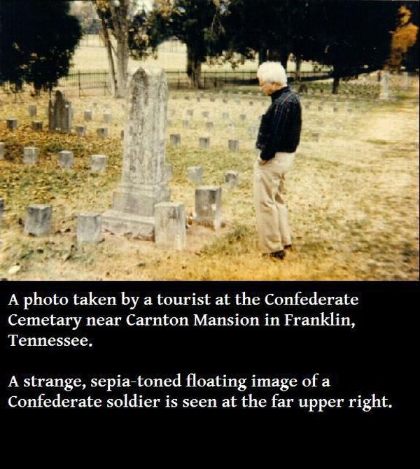 real life true ghost - A photo taken by a tourist at the Confederate Cemetary near Carnton Mansion in Franklin, Tennessee. A strange, sepiatoned floating image of a Confederate soldier is seen at the far upper right.