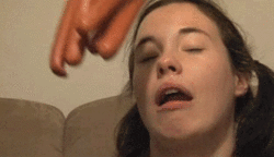 hot dogs in face gif