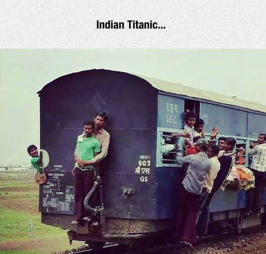Offensive meme about the Indian version of Titanic, with a picture of two guys holding onto the train.