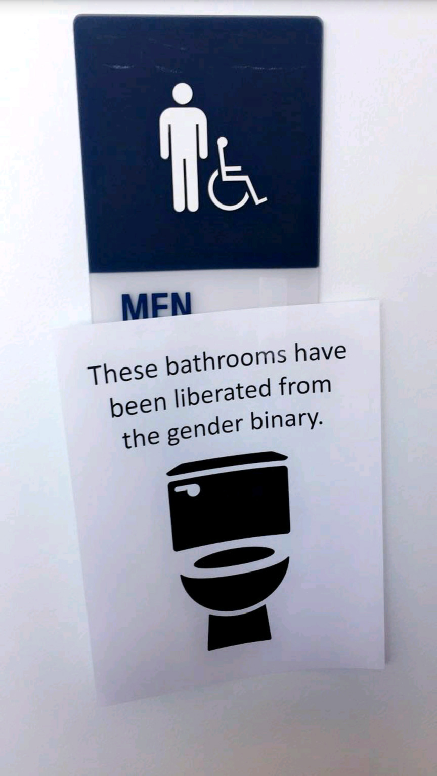 label - Men These bathrooms have been liberated from the gender binary.