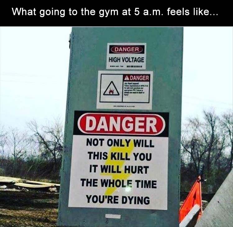 Warning sign on electrical pole with caption joking that it how it feels going to the gym at 5am
