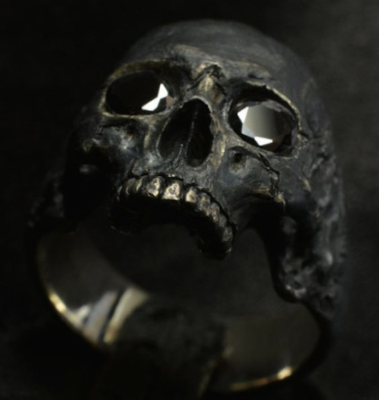 Jewel encrusted melting skull with black rubies for eyes- last image of the list for Hump Day.