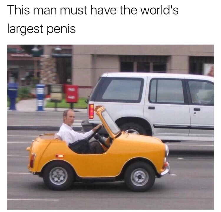 Man driving a tiny yellow car captioned as he must have the world's largest penis.