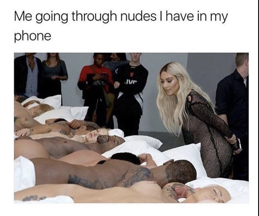 Kardashian looking at men sleeping