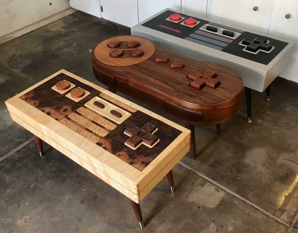 Coffee tables that are shaped like old game controllers.