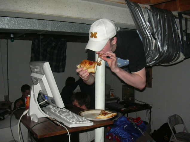 guy duct taped to ceiling lan party