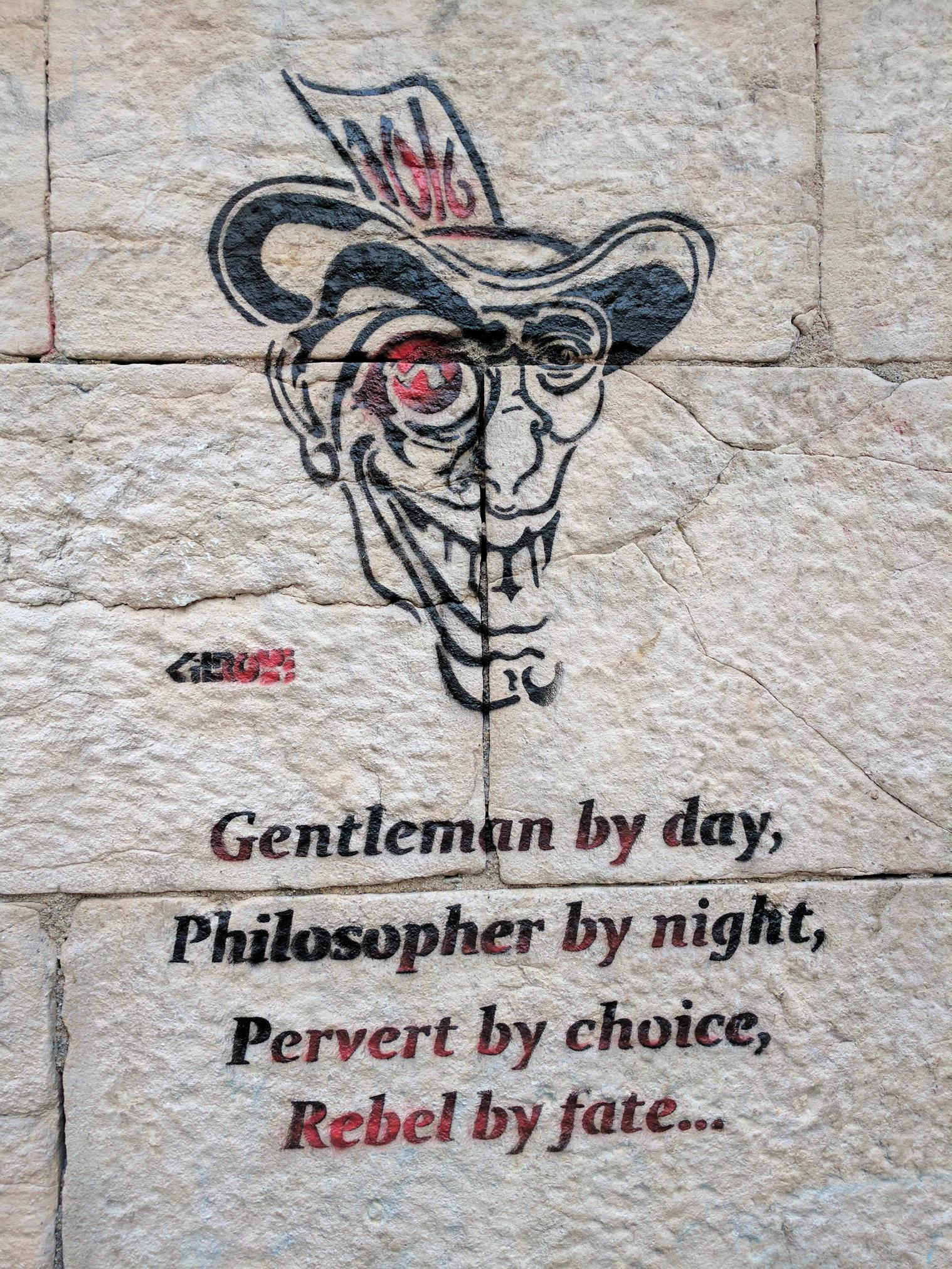 street art - Gentleman by day, Philosopher by night, Pervert by choice, Rebel by fate...