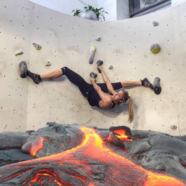 Girl climbing over lava while doing splits