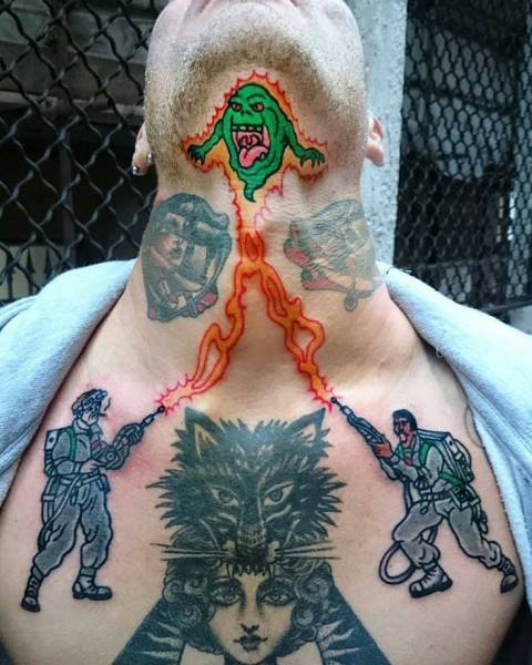 Man with Ghostbusters tattoo on his chest and chin.