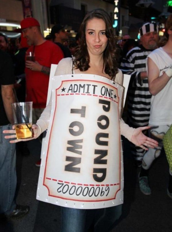 Girl wearing a ticket to pound town for her costume.