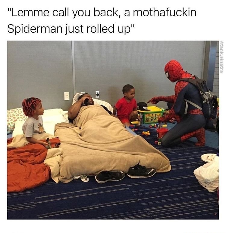 Pic from Houston shelter in which dad gets off the phone because Spiderman just rolled up.