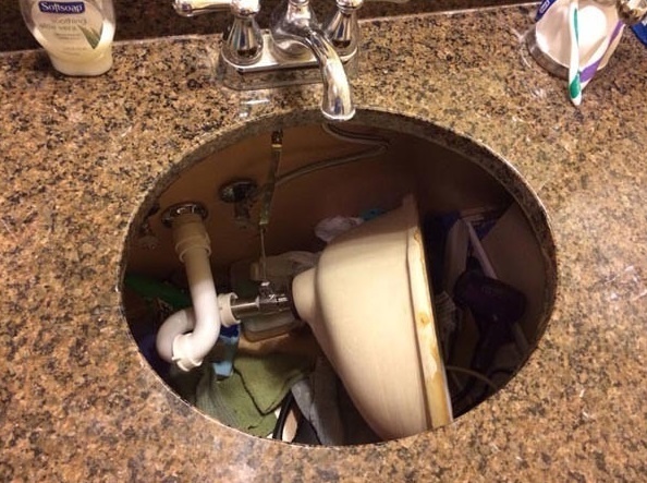 Sink that fell in and is now a huge mess