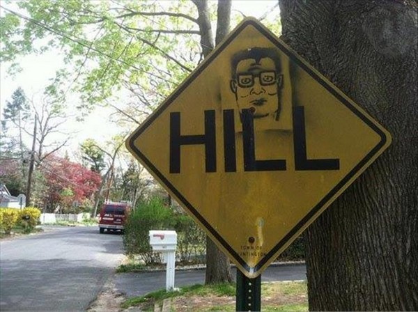 Hank Hill stenciled onto a sign that reads HILL