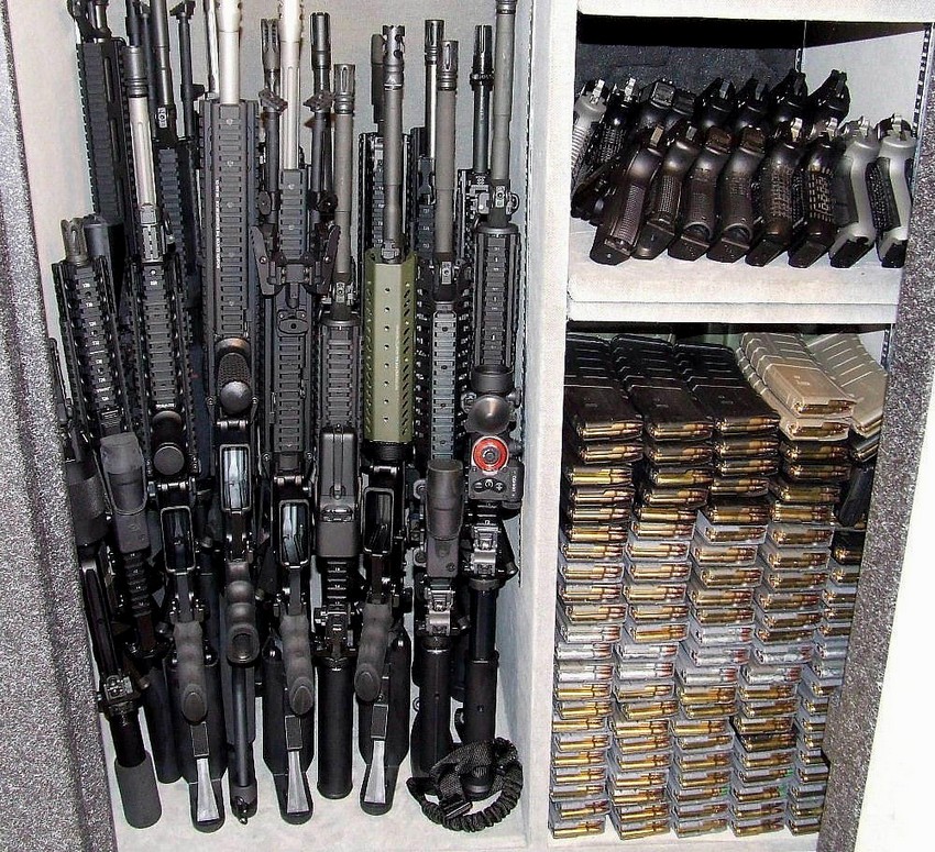 Gun safe with ammo, rifles and pistols
