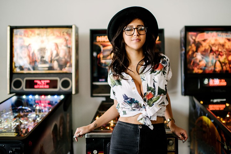 Unsurprisingly, April O’Neil loves the Teenage Mutant Ninja Turtles, but she also loves pinball and pop-punk.