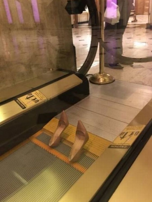 random pic heels stuck in escalator