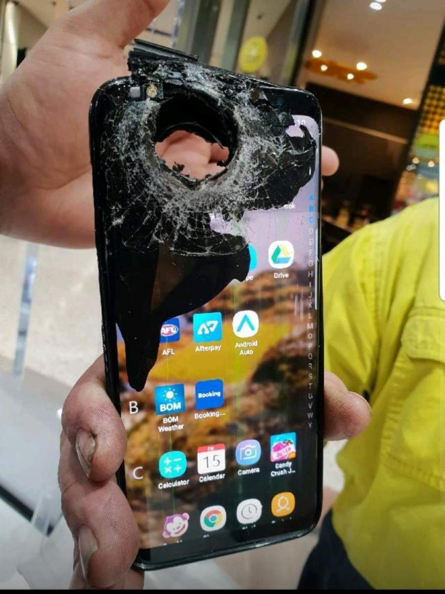 iphone x that took a bullet or some other implement