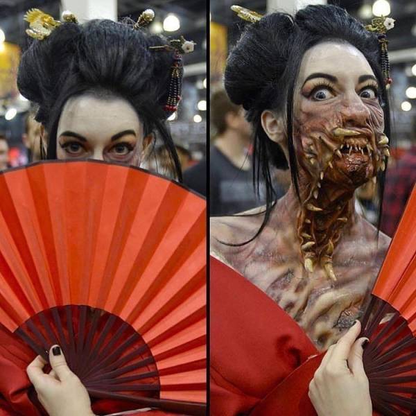 Woman moves away her fan to reveal awesome makeup for her cosplay