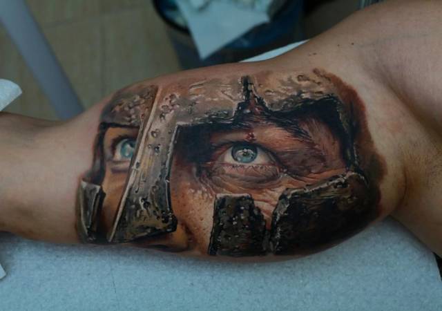 gladiator tattoo biceps