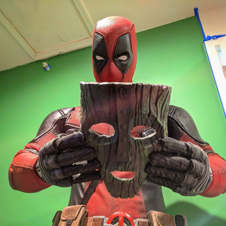 Deadpool contemplating putting on The Mask