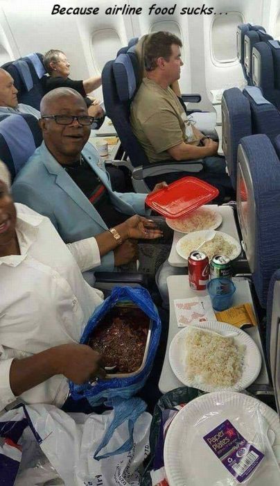 people on an airplane and they brought lot of food