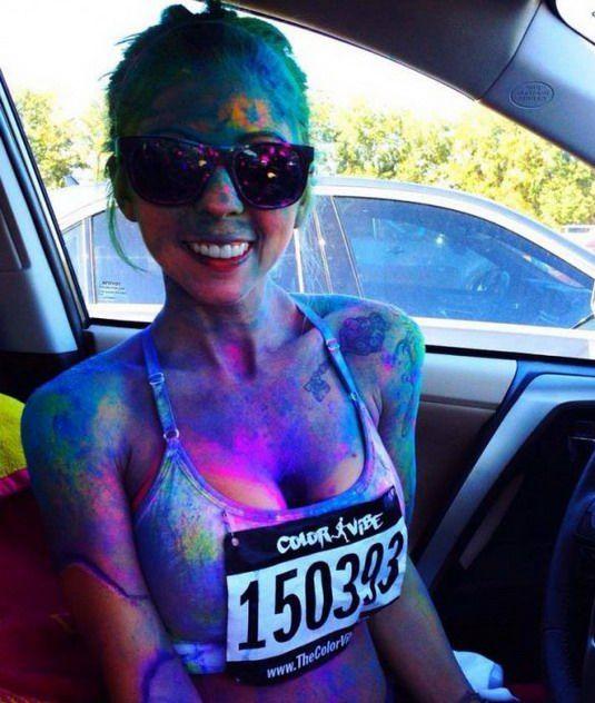 girl covered in colorful paint