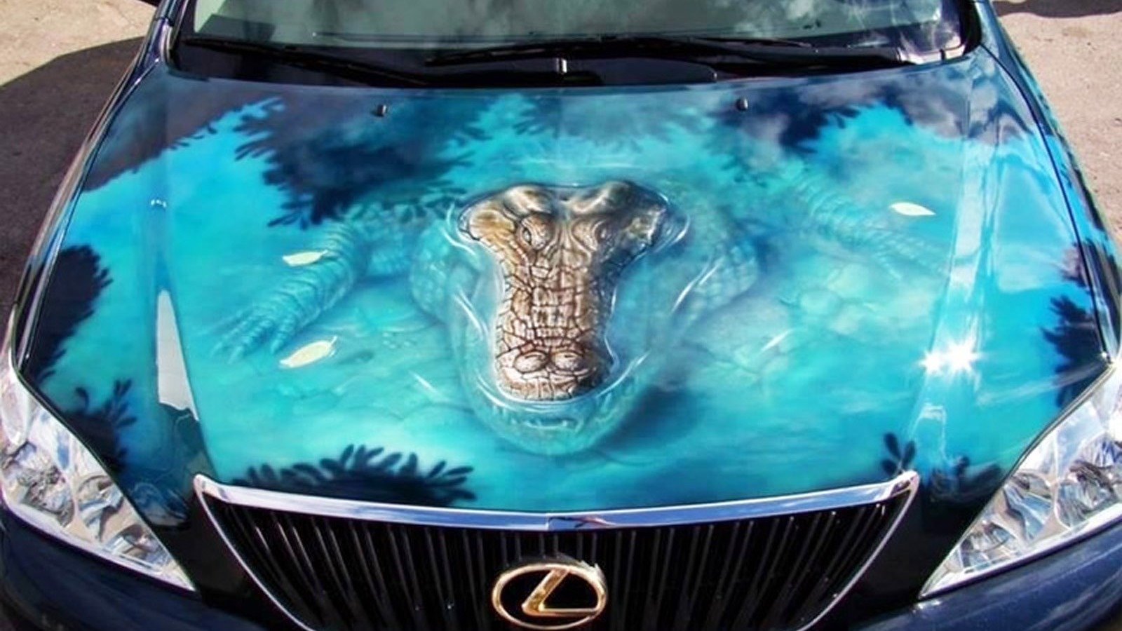 alligator coming out of the water airbrushed onto a hood of a lexus