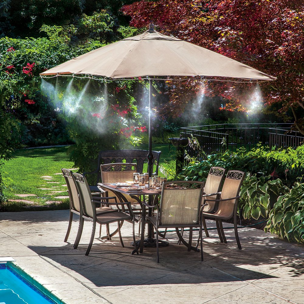 Is the shade not doing it for you? That mean sun a little too mean for you to enjoy the backyard that you worked hard for? Get one of these clever mist systems available <a href=https://amzn.to/2L5oLLq target="_blank" nofollow noreferrer>here.</a>