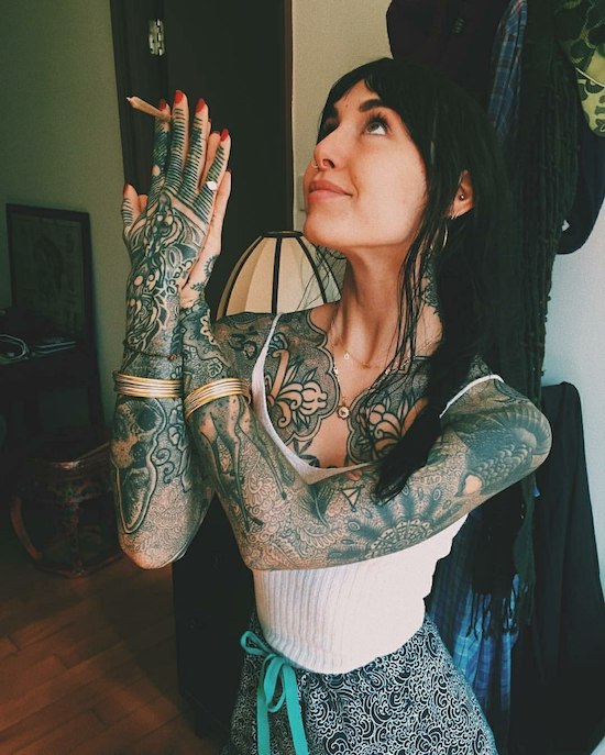 cool pic of a cute girl with lots of tattoos