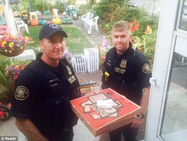 When police swear to protect and serve, they do not just mean the first part. Two policemen in Portland, Oregon went above and beyond the line of duty when they finished off a driver's pizza delivery after he had been involved in a car accident.