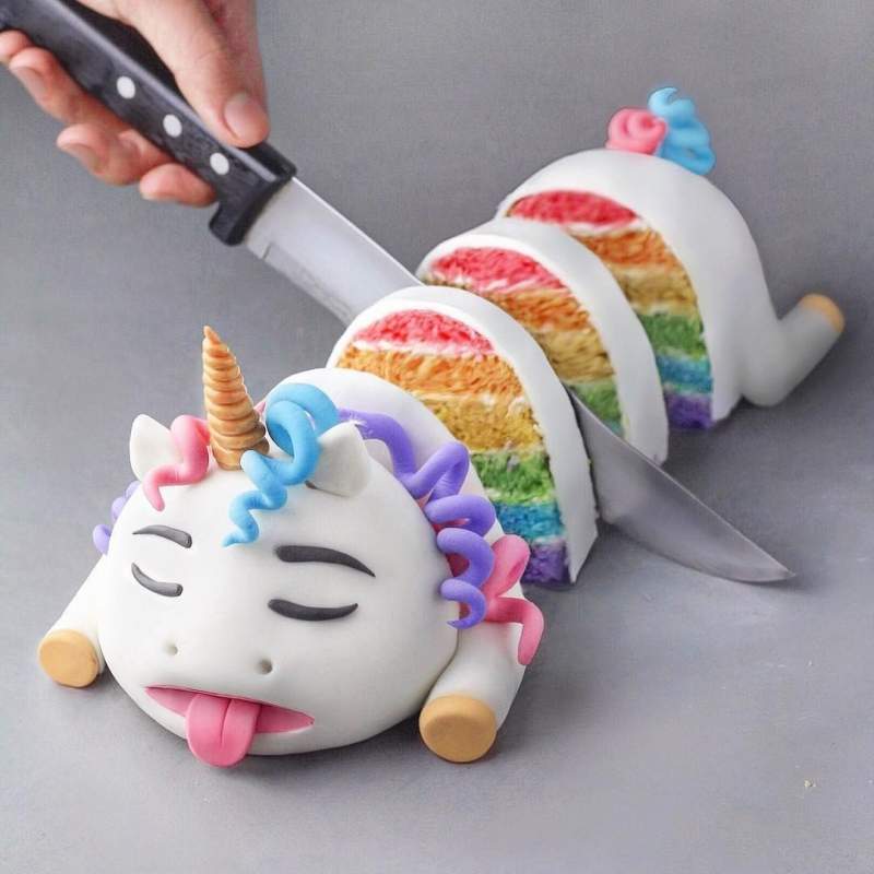 sliced rainbow cake of a BBQ unicorn