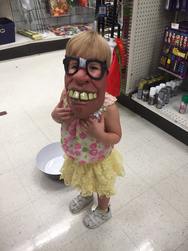 funny mask on a little girl