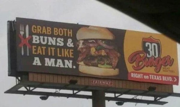 billboard - Grab Both Buns & | Eat It A Man. Right on Texas Blvd. > Eateway