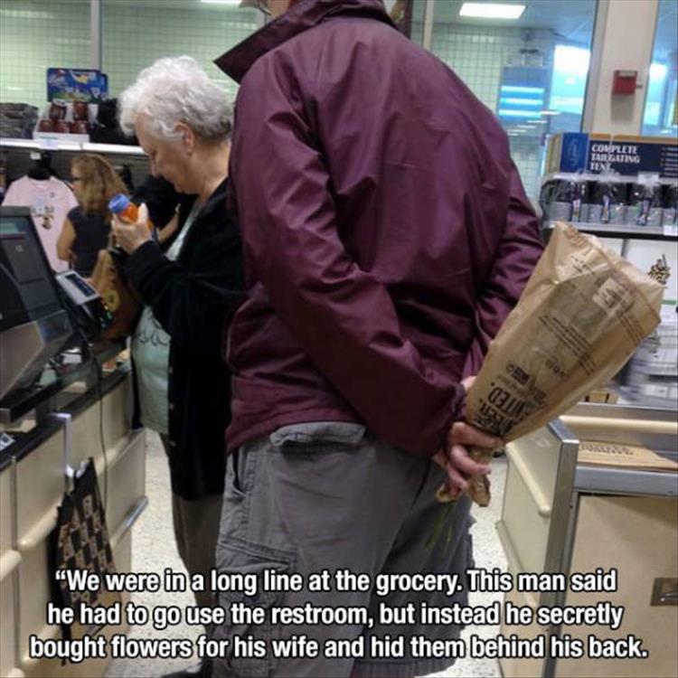 heartwarming Photograph - Complete Targeting Ten "We were in a long line at the grocery. This man said he had to go use the restroom, but instead he secretly bought flowers for his wife and hid them behind his back.