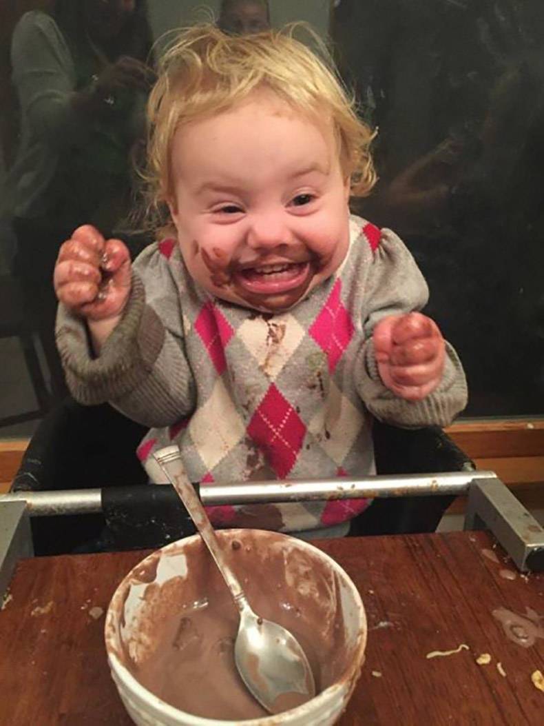 random pic child covered in chocolate ice cream